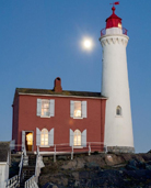 A lighthouse at night.