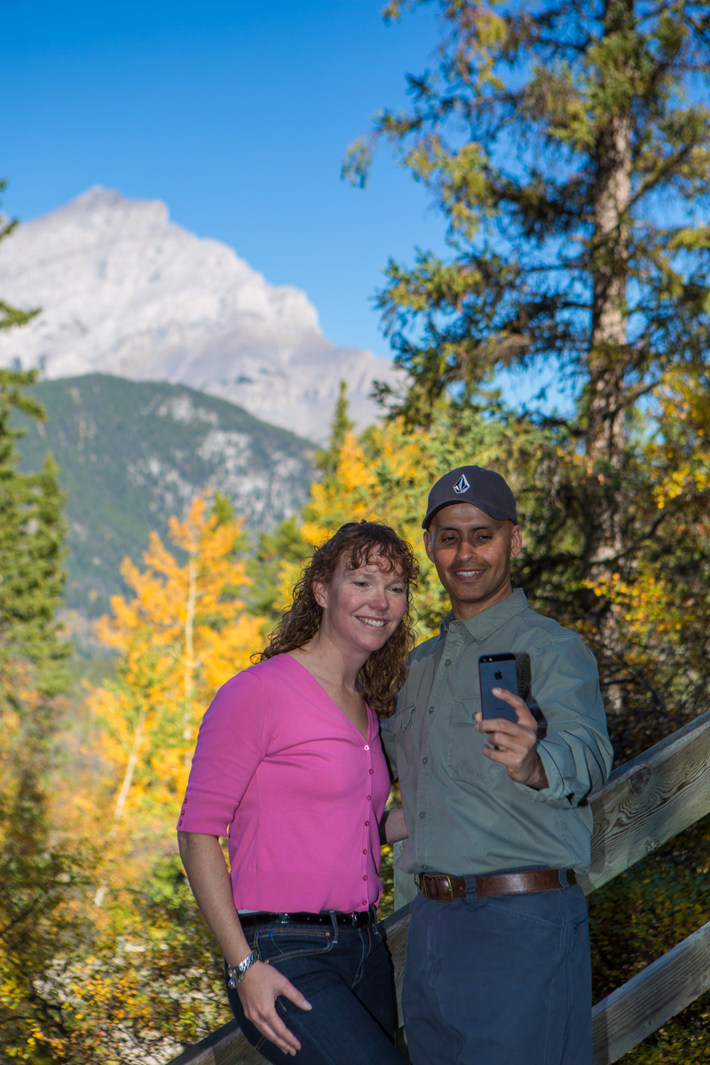 A couple on a boardwalk, near Cave and Basin