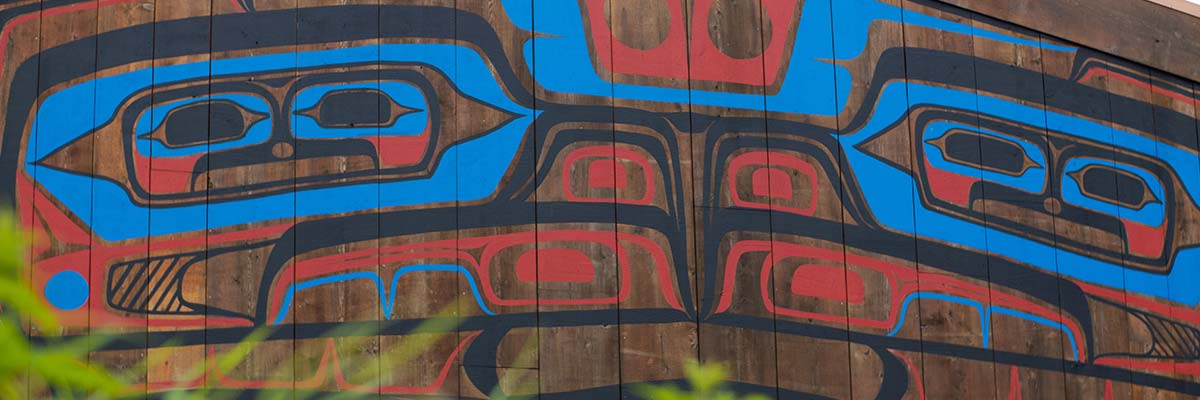 Painted front of the Heiltsuk First Nation's Big House