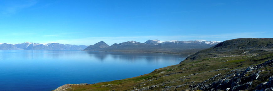 Arctic inlet with mountains in background