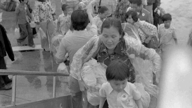 Vietnamese refugees boarding second Airlift from Hong Kong to Canada