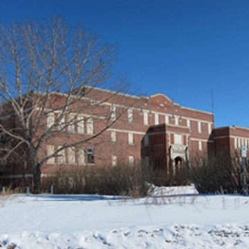 A large building in a winter setting