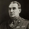 Black and white portrait of a man in military uniform