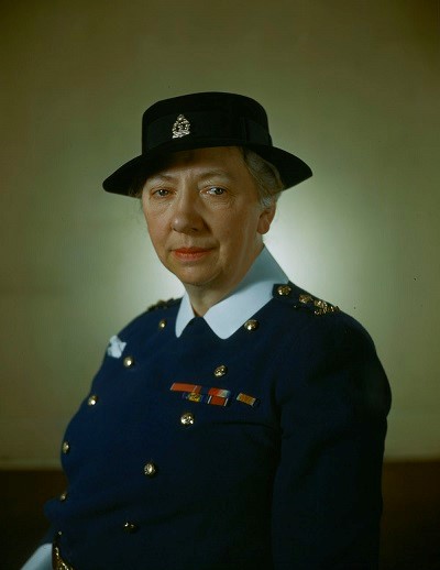 A women's portrait, wearing a uniform