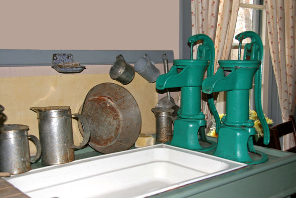 Pump in kitchen at Woodside National Historic Site