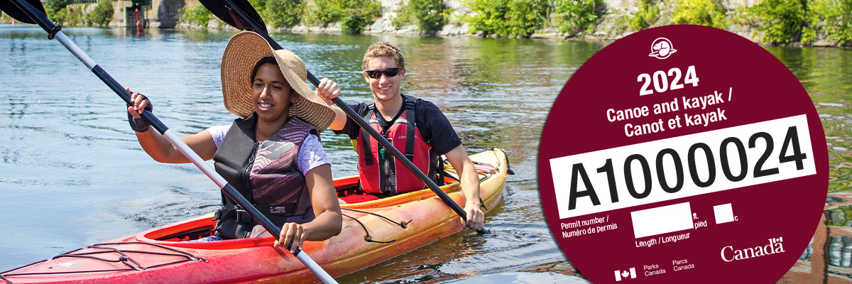 Two people in a tandem kayak at the Lachine Canal National Historic Site