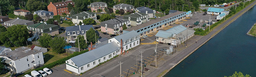Aerial view of a waterway and buildings along it