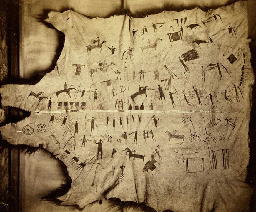 On the leathery side of a bison hide is a series of pictographs showing human and horse figures.