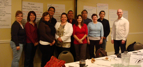 Huu-ay-aht First Nations and Parks Canada Cooperative members at a meeting