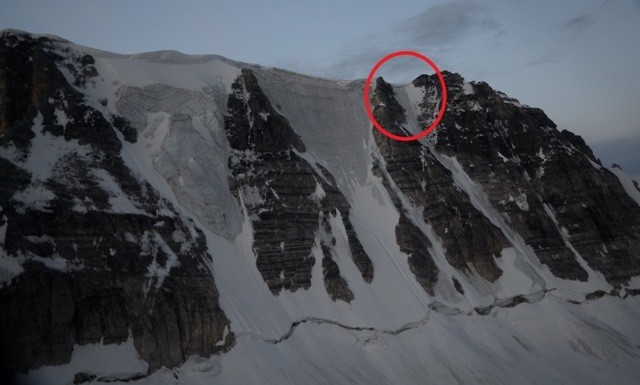The north face of Mt. Fay.  The red circle shows the approximate location of the rockfall accident on the Roth- Kallen route.  Note the large cornices still overhanging all routes on this north face.  