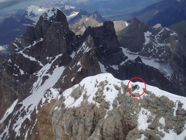 summit of Goodsir South Tower.  The stranded climbers are circled, and Goodsir North Tower is in the background.