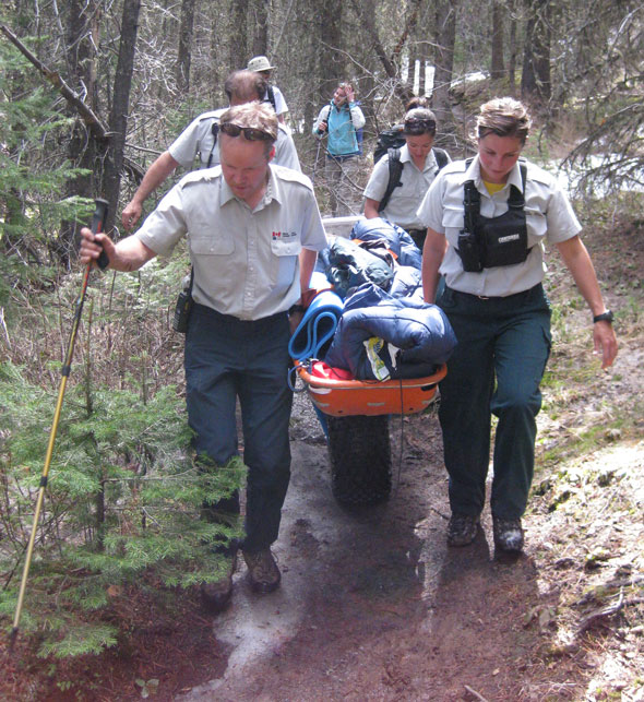 Parks Canada rescue service members respond to an easily accessed accident. 