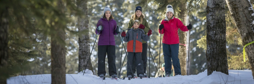 A family on the cross country ski trails