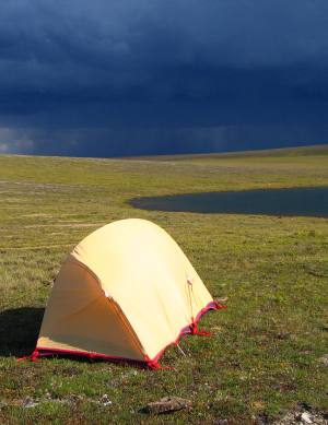 tent with thunderstorm incoming