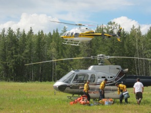 fire crew loading helicopter