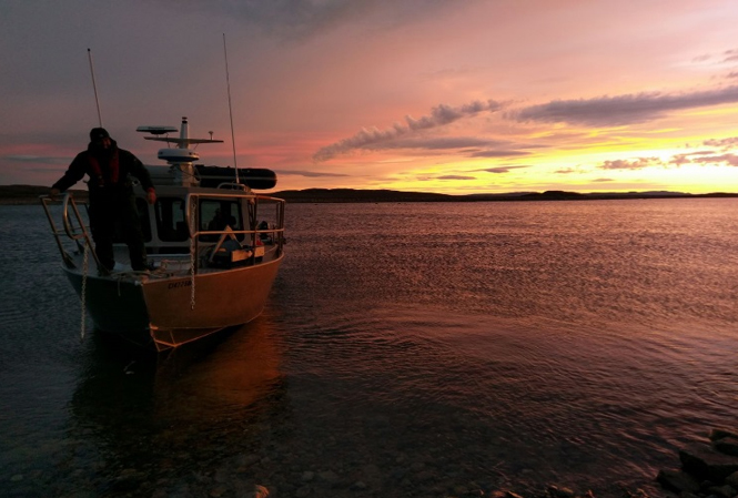 A boat on Wager Bay at sunset.