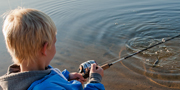 A child fishing.