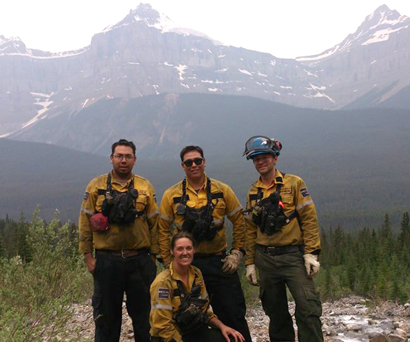 Pukaskwa National Park’s 2014 Fire Crew in Banff [L-R: Kyle Nabigon, Basil Goodchild, Ben Lacrooy, and Courtney Baldwin (kneeling)]