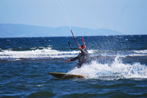 Kite surfer on the sea.
