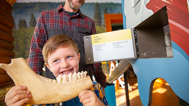 Visitors explore the Parks Canada Nature Centre in Waskesiu in Prince Albert National Park.