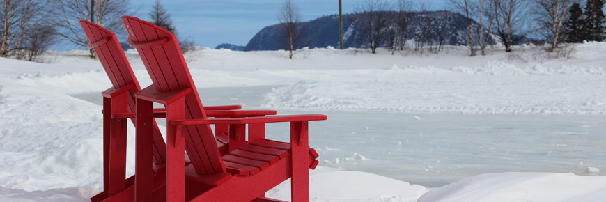 Two red chairs facing the Ice Trail.