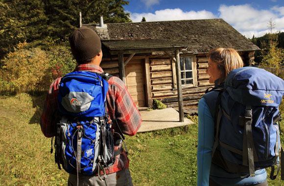 Millennials hiking to the Grey Owl day Cabin at  Prince Albert National Park