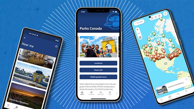 Three cell phones showing the Parks Canada application on their screens.