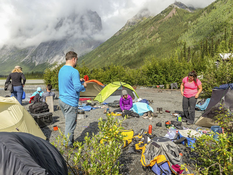 Campers at Glacier Lake, staging area to Fairy Meadows at the Cirque of Unclimbables.