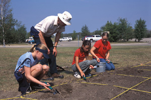 Children's archaeological dig with David Palmer at Batoche National Historic Site of Canada (Sask.)