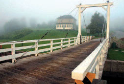 King post swing bridges
